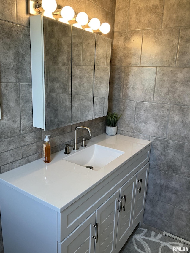136 W Mill St, Kewanee, IL 61443 - bathroom with vanity and tile walls