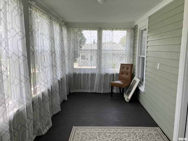 136 W Mill St, Kewanee, IL 61443 - sunroom with hardwood / wood-style flooring and crown molding