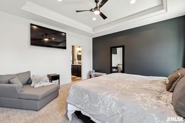 18101 271st St, Long Grove, IA 52756 - bedroom with a tray ceiling, light colored carpet, recessed lighting, baseboards, and ensuite bath