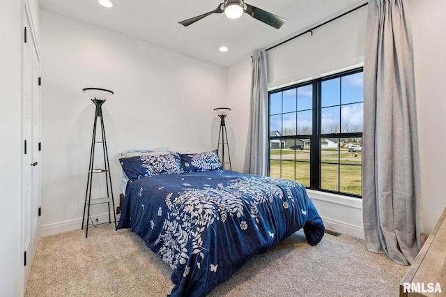 18101 271st St, Long Grove, IA 52756 - carpeted bedroom with recessed lighting, baseboards, and a ceiling fan