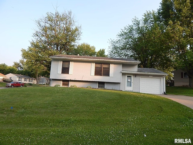 4125 Cresthill Dr, Davenport, IA 52806 - tri-level home with a garage, concrete driveway, and a front yard