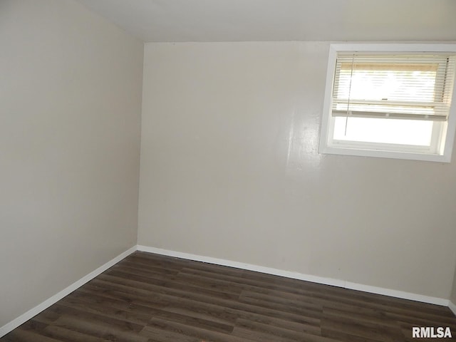 4125 Cresthill Dr, Davenport, IA 52806 - spare room with dark wood finished floors and baseboards
