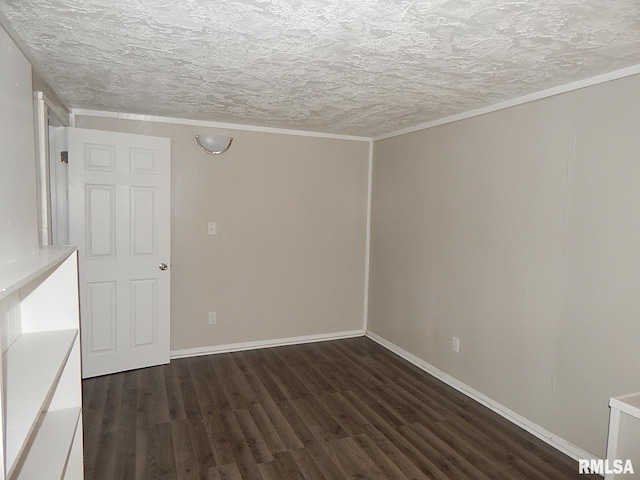 4125 Cresthill Dr, Davenport, IA 52806 - spare room with dark wood-type flooring and a textured ceiling