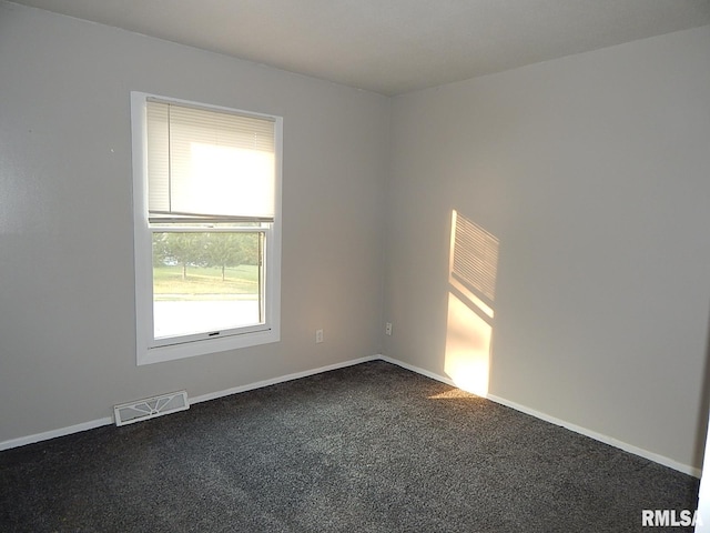 4125 Cresthill Dr, Davenport, IA 52806 - unfurnished room with dark carpet and baseboards