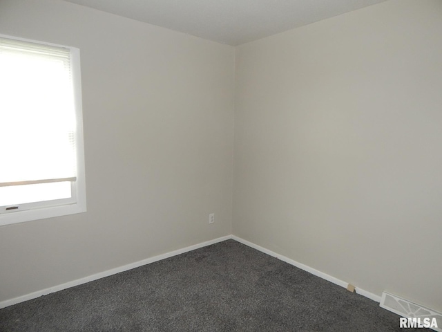 4125 Cresthill Dr, Davenport, IA 52806 - unfurnished room with dark carpet and baseboards
