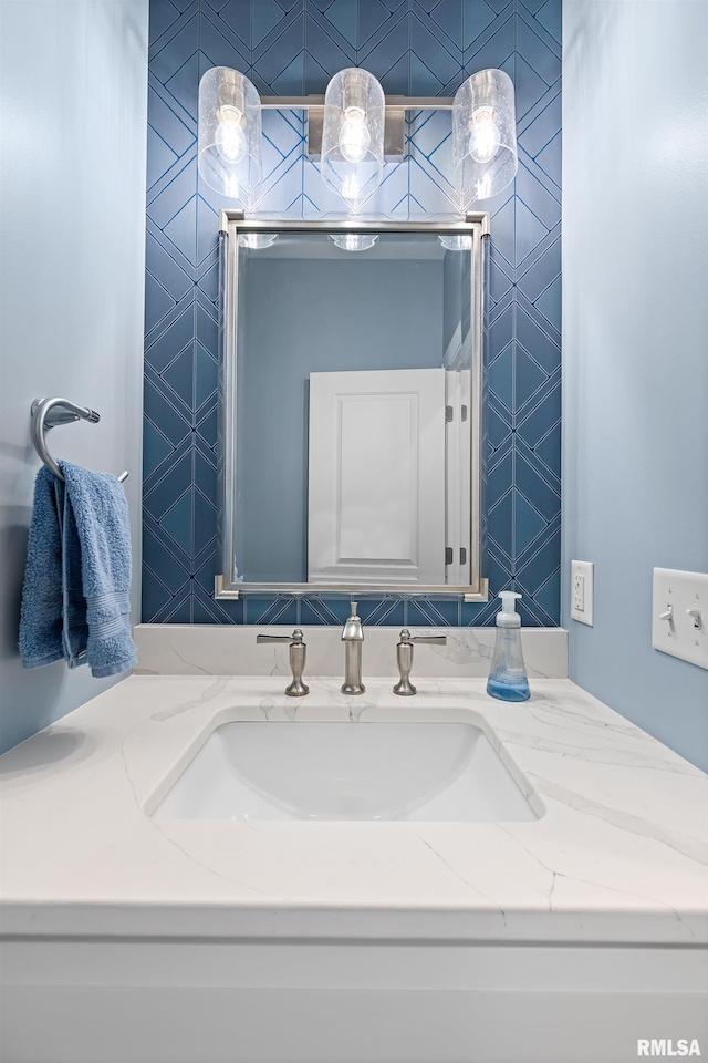 1100 Wild W Dr, Le Claire, IA 52753 - bathroom with vanity and wallpapered walls