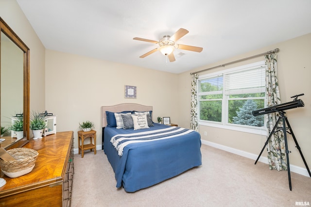 1100 Wild W Dr, Le Claire, IA 52753 - bedroom with carpet and ceiling fan