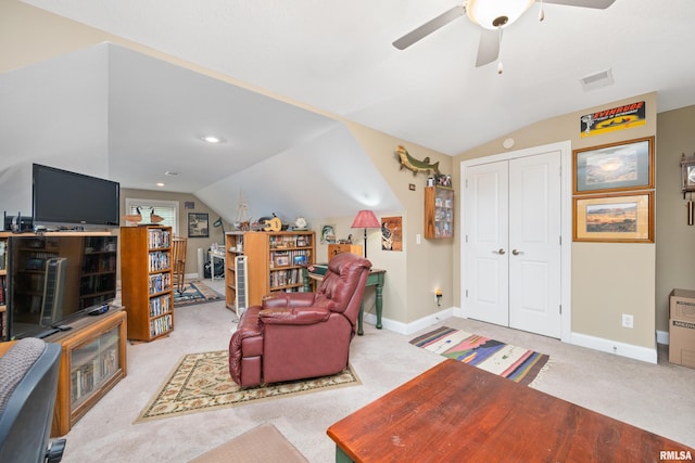 1100 Wild W Dr, Le Claire, IA 52753 - living room with vaulted ceiling, carpet, and ceiling fan