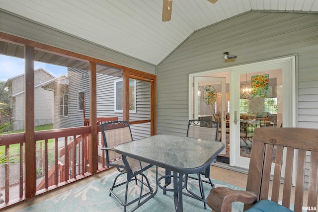 1100 Wild W Dr, Le Claire, IA 52753 - sunroom / solarium with lofted ceiling, ceiling fan, and outdoor dining area