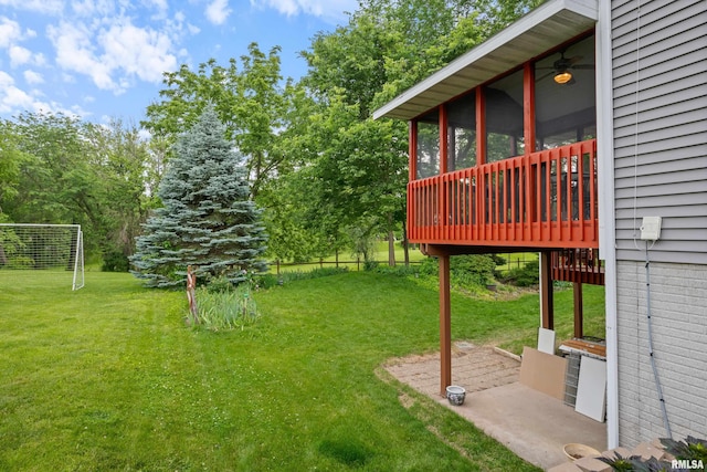 1100 Wild W Dr, Le Claire, IA 52753 - view of yard featuring a sunroom