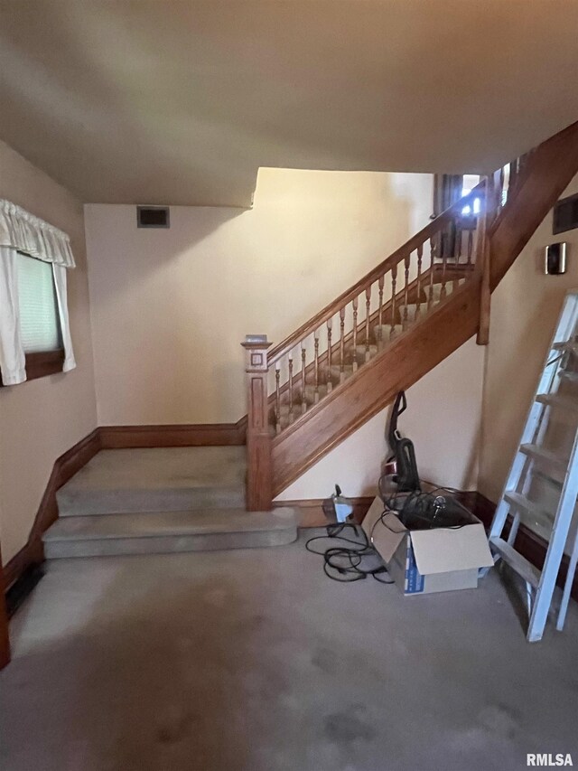 1109 S Michigan St, Davenport, IA 52802 - stairway with carpet floors and baseboards