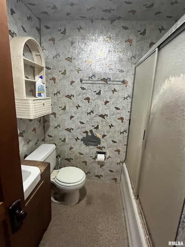 1109 S Michigan St, Davenport, IA 52802 - full bathroom with vanity, toilet, and wallpapered walls