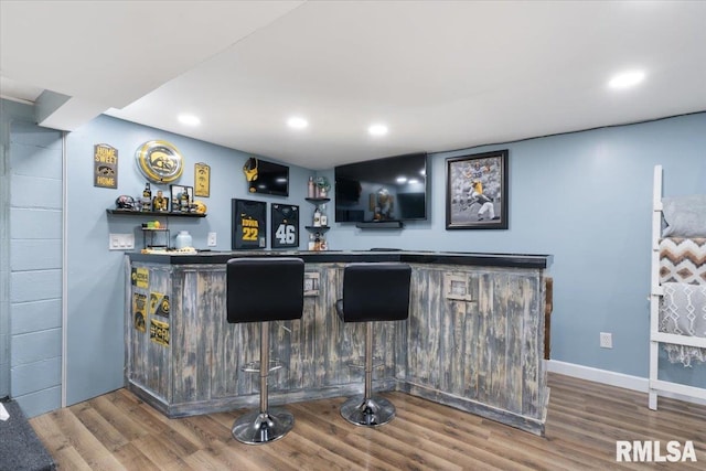 306 Myra Pl, Clinton, IA 52732 - indoor bar with wood finished floors and recessed lighting