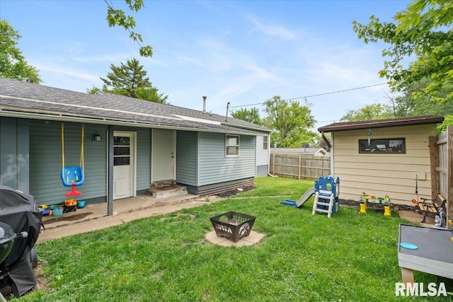 306 Myra Pl, Clinton, IA 52732 - view of yard with an outdoor fire pit