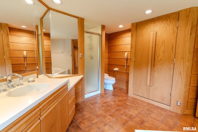7 Sharon Ln, Fulton, IL 61252 - bathroom featuring vanity, a stall shower, toilet, recessed lighting, and tile patterned floors