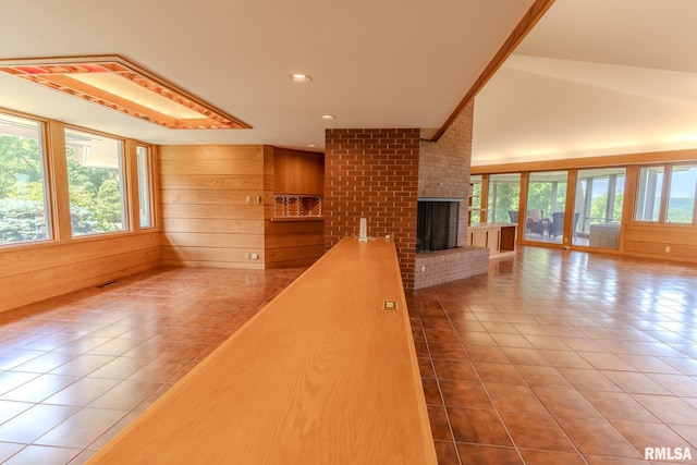 7 Sharon Ln, Fulton, IL 61252 - corridor with tile patterned floors, recessed lighting, and wood walls