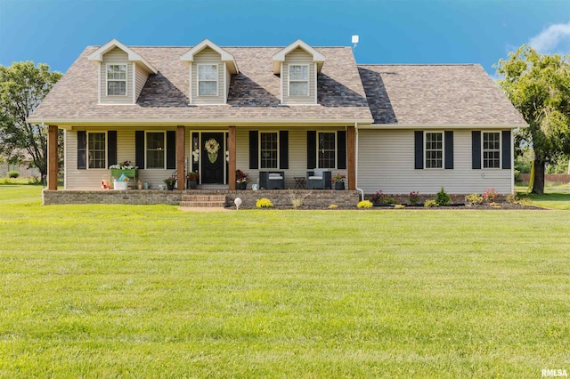 1710 Broeking Rd, Marion, IL 62959 - cape cod home with a front lawn, covered porch, and roof with shingles