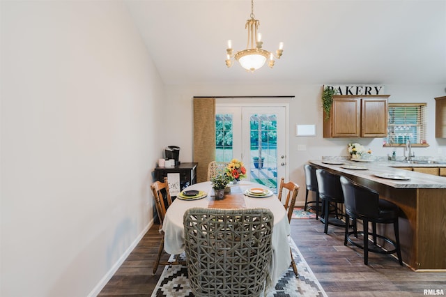 1710 Broeking Rd, Marion, IL 62959 - dining space with a chandelier, dark wood-style flooring, baseboards, and vaulted ceiling