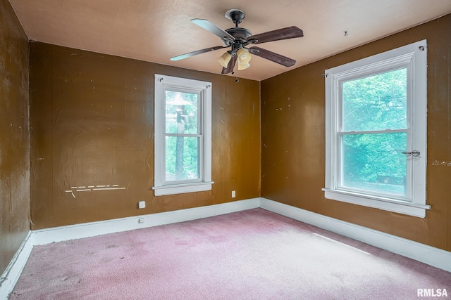 1032 Kirkwood Blvd, Davenport, IA 52803 - spare room featuring carpet floors and ceiling fan