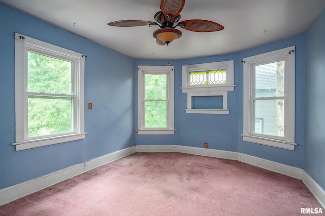 1032 Kirkwood Blvd, Davenport, IA 52803 - carpeted empty room featuring baseboards and ceiling fan