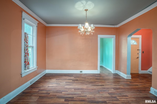 1032 Kirkwood Blvd, Davenport, IA 52803 - unfurnished dining area featuring a chandelier, arched walkways, crown molding, and dark wood-style floors
