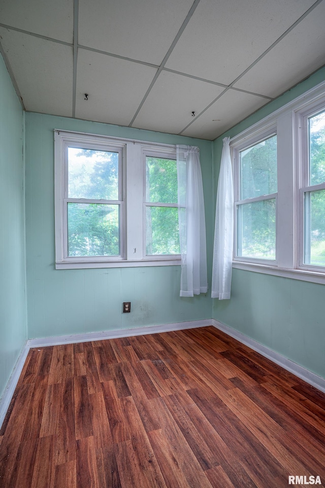 1032 Kirkwood Blvd, Davenport, IA 52803 - spare room with wood finished floors and baseboards