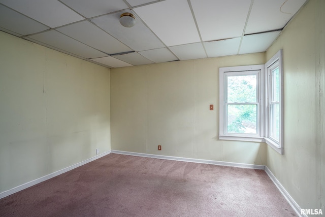1032 Kirkwood Blvd, Davenport, IA 52803 - spare room featuring carpet and a paneled ceiling