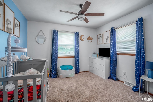 3436 Ridge Ct, Davenport, IA 52806 - bedroom featuring carpet flooring and a ceiling fan