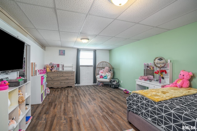 3436 Ridge Ct, Davenport, IA 52806 - bedroom featuring dark wood-style flooring and a drop ceiling