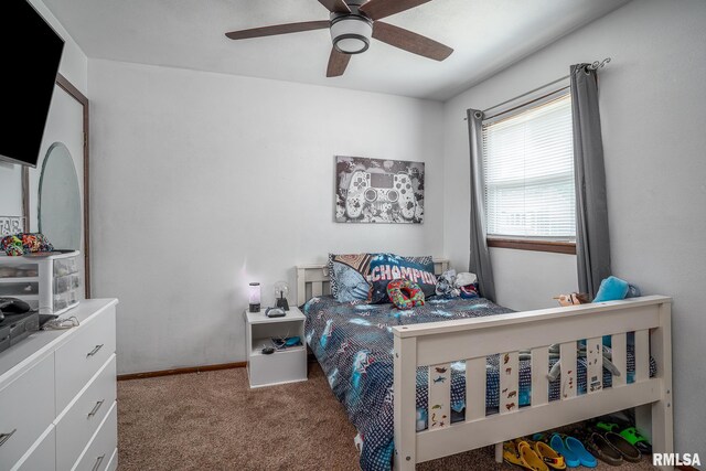 3436 Ridge Ct, Davenport, IA 52806 - carpeted bedroom featuring ceiling fan and baseboards