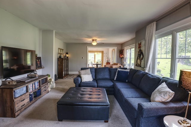 115 4th St, Fulton, IL 61252 - living area featuring carpet floors, healthy amount of natural light, and a ceiling fan