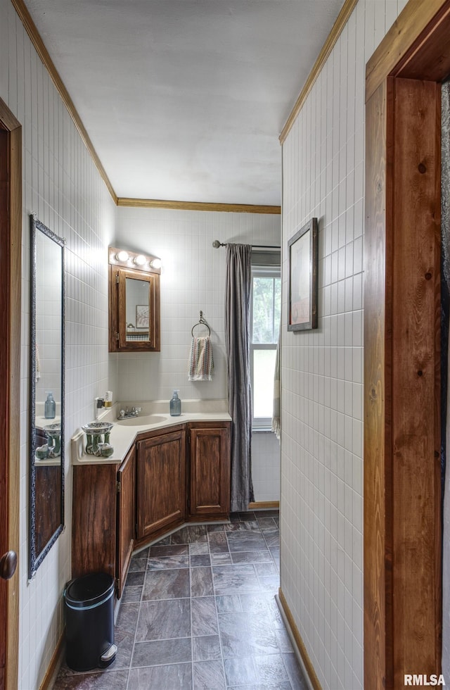 115 4th St, Fulton, IL 61252 - bathroom featuring ornamental molding, stone finish flooring, and vanity
