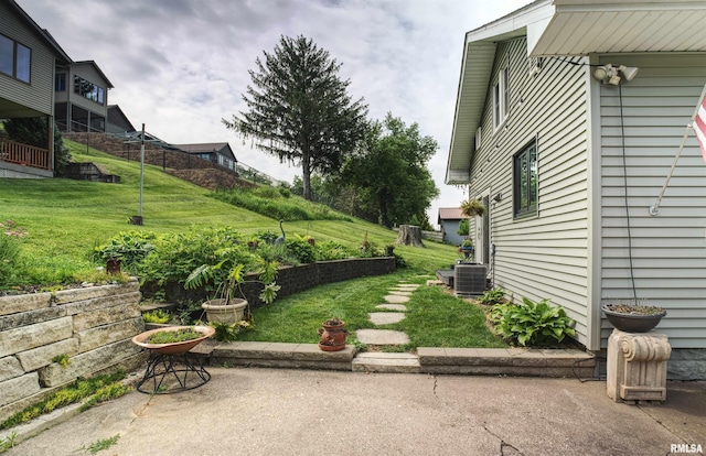 115 4th St, Fulton, IL 61252 - view of grassy yard with a patio area