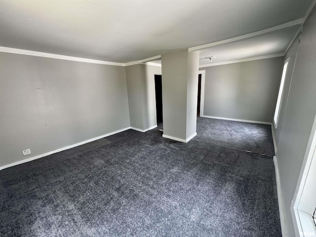 1150 14th Ave, Moline, IL 61265 - unfurnished room featuring dark colored carpet and ornamental molding