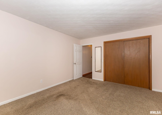 2678 170th Ave, Sherrard, IL 61281 - unfurnished bedroom with a closet and carpet