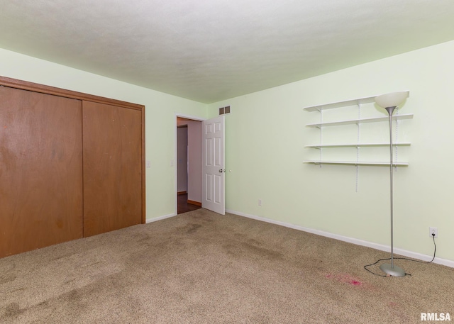 2678 170th Ave, Sherrard, IL 61281 - unfurnished bedroom featuring carpet and a closet
