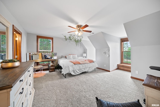 5 High Point Pl, Bettendorf, IA 52722 - bedroom with light carpet, multiple windows, vaulted ceiling, and ceiling fan