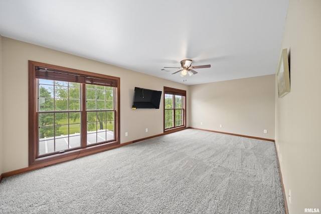 5 High Point Pl, Bettendorf, IA 52722 - carpeted empty room featuring baseboards and ceiling fan