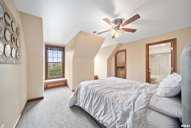 5 High Point Pl, Bettendorf, IA 52722 - carpeted bedroom with a ceiling fan, vaulted ceiling, and connected bathroom