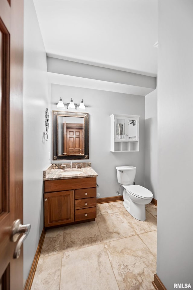 5 High Point Pl, Bettendorf, IA 52722 - bathroom featuring toilet and vanity