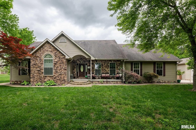 1300 W Brewster Rd, Herrin, IL 62948 - single story home featuring stone siding, a front lawn, and roof with shingles