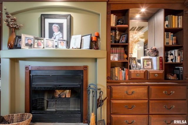 1300 W Brewster Rd, Herrin, IL 62948 - detailed view of a glass covered fireplace and built in features