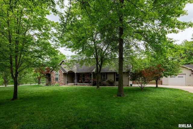 1300 W Brewster Rd, Herrin, IL 62948 - view of front facade with a front lawn, driveway, a porch, and an attached garage