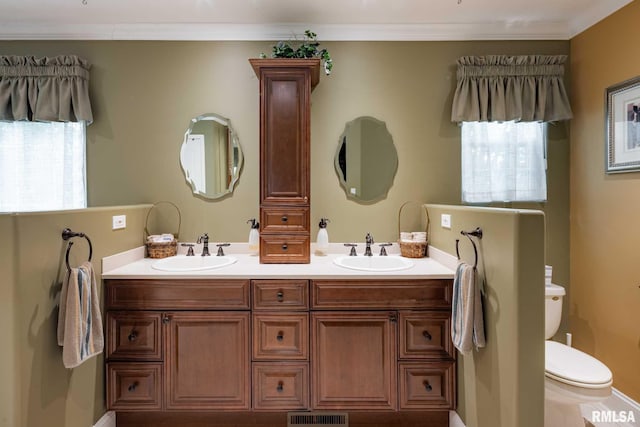 1300 W Brewster Rd, Herrin, IL 62948 - bathroom featuring double vanity and ornamental molding