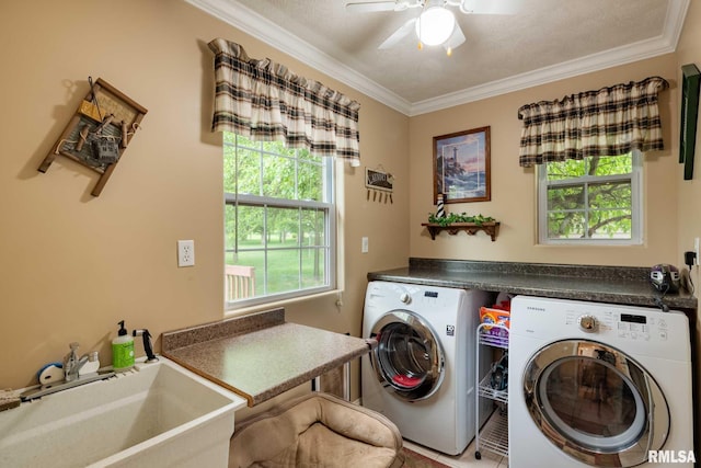 1300 W Brewster Rd, Herrin, IL 62948 - laundry area featuring washing machine and dryer, crown molding, and ceiling fan