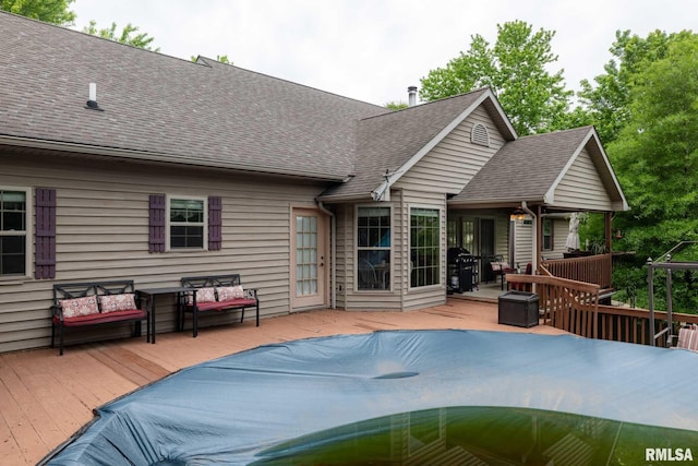 1300 W Brewster Rd, Herrin, IL 62948 - view of pool featuring a wooden deck, a covered pool, and grilling area