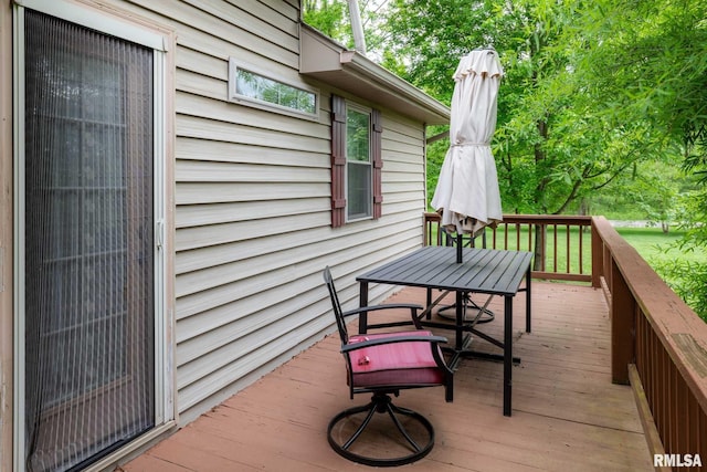 1300 W Brewster Rd, Herrin, IL 62948 - wooden deck with outdoor dining area