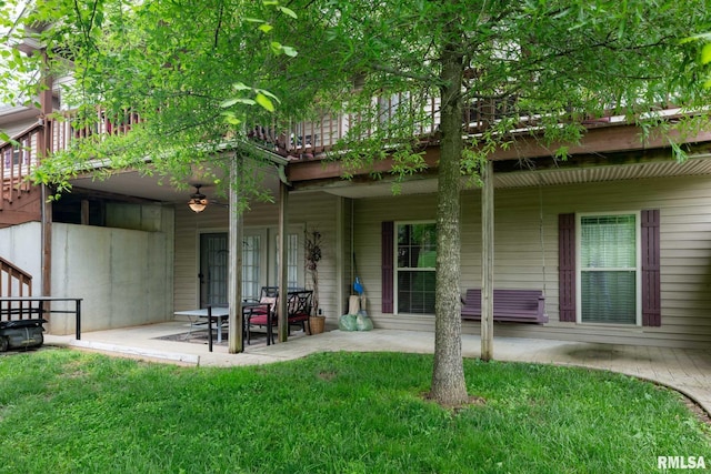 1300 W Brewster Rd, Herrin, IL 62948 - back of house with a patio area, a lawn, and a ceiling fan