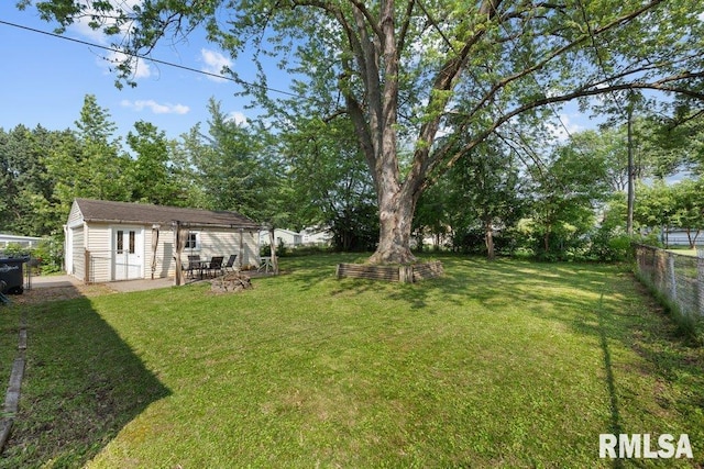 1623 Alcoa Ave, Bettendorf, IA 52722 - view of yard with an outbuilding, a patio area, and view of scattered trees