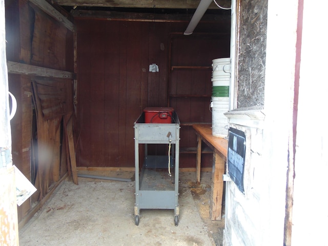15321 Cherry St, Carterville, IL 62918 - misc room with wooden walls and concrete floors